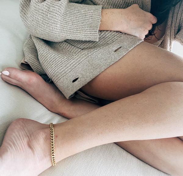 Woman with gold anklet